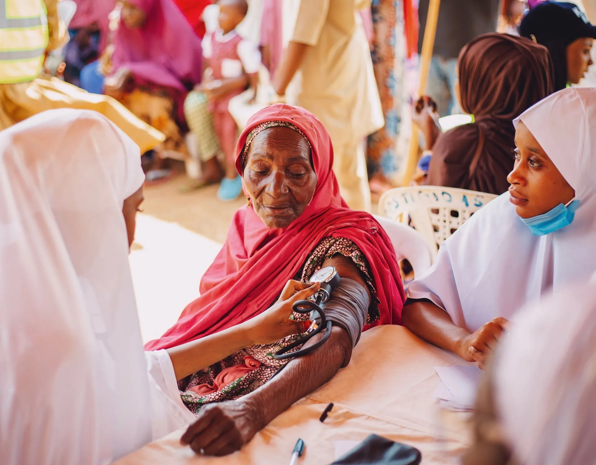 A health worker giving a child an immunization